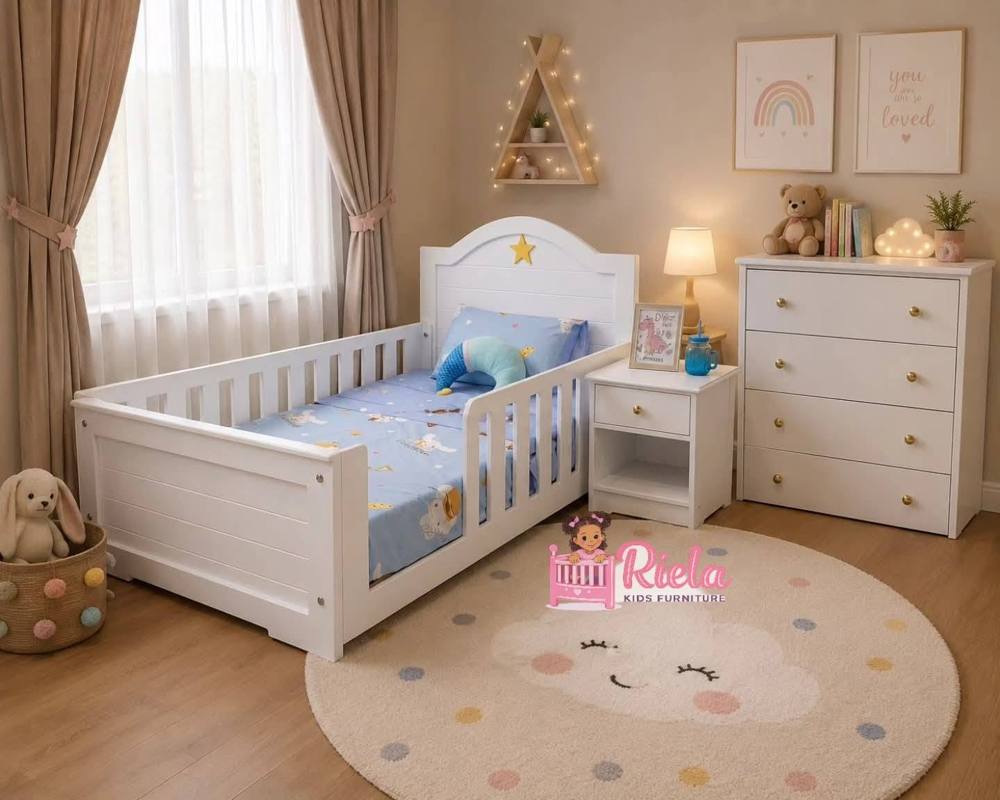 Close view of a toddler bed with rounded rails